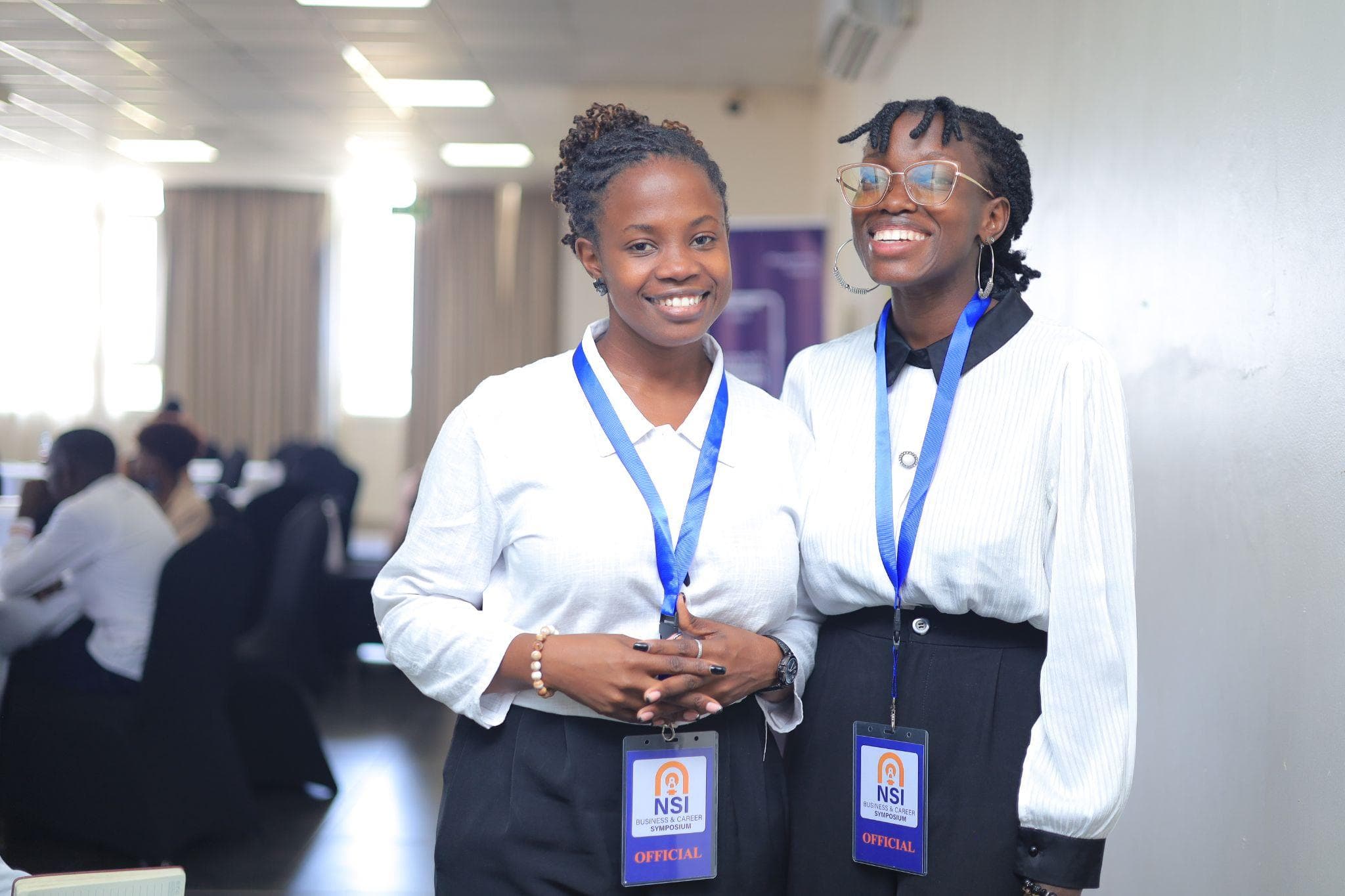 Future Den participants smiling together at a career symposium